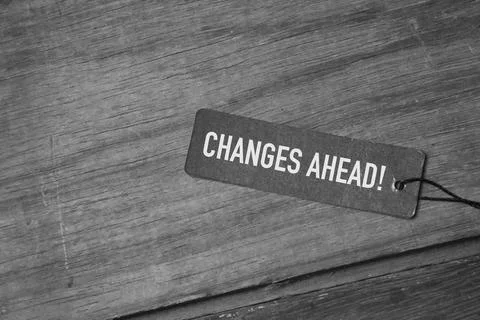 Memo note written with CHANGES AHEAD! over wooden background Stock Photos