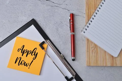 Memo note written with text APPLY NOW!. Stock Photos