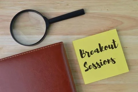Memo note written with text BREAKOUT SESSIONS. Top view. Stock Photos