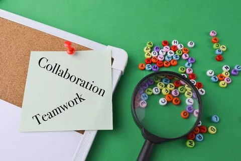 Memo note written with text COLLABORATION and TEAMWORK. Business and educatio Stock Photos