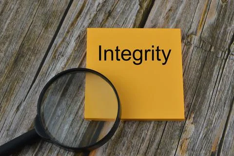 Memo note written with text INTEGRITY. Stock Photos