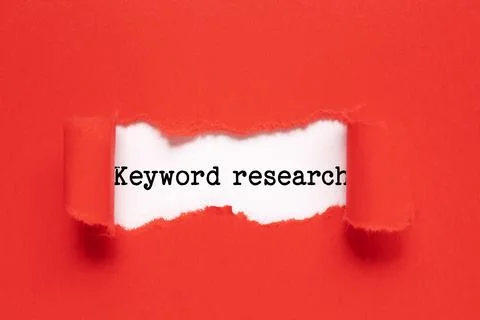 Memo note written with text keyword research on red background. Business Conc Stock-Fotos