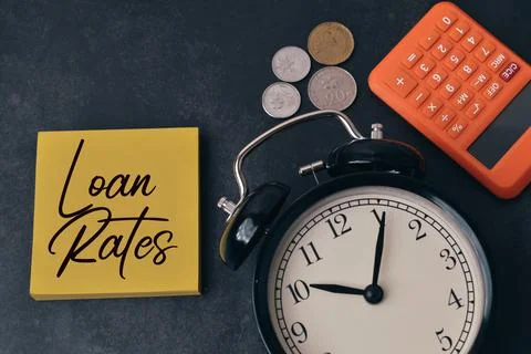 Memo note written with text LOAN RATES. Stock Photos