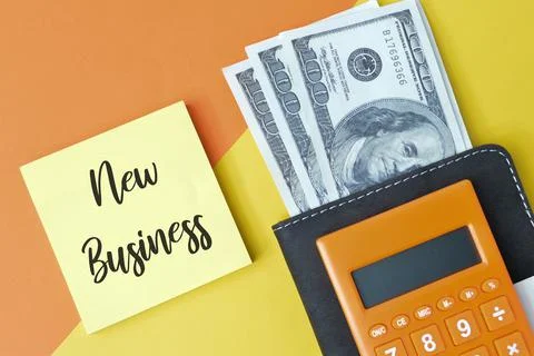 Memo note written with text NEW BUSINESS. Top view. Stock Photos
