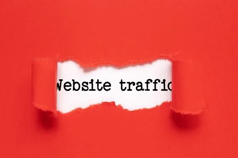 Memo note written with text WEBSITE TRAFFIC on red background. Stock Photos
