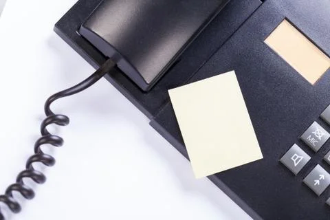 Memo post it message on telefone in office Stock Photos
