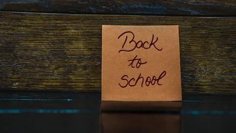 Memo post reminder with text Back to school. Stock Photos