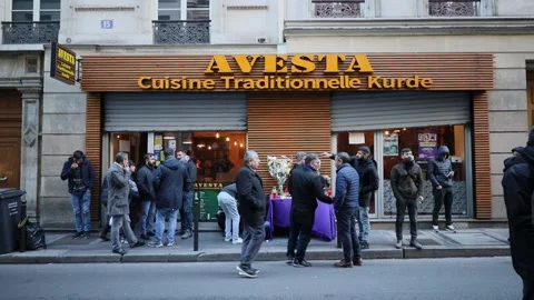 Memorial for kurdish victims of shooting attack in Paris , 25 december 2022 Stock Footage 228466111