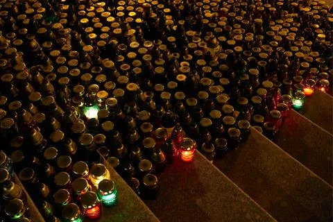 Memorial multicolor candles on the steps Stock Photos