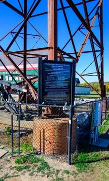 Memorial plaque dedicated to the centennial of the Red Fork Oil Derrick, lo.. Stock Photos