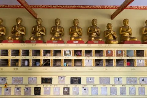 Memorial Plaques Mounted on a Wall inside Buddhist temple Stock Photos