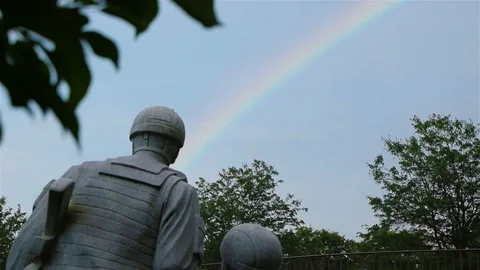 Memorial statue and rainbow Stock Footage 112892820