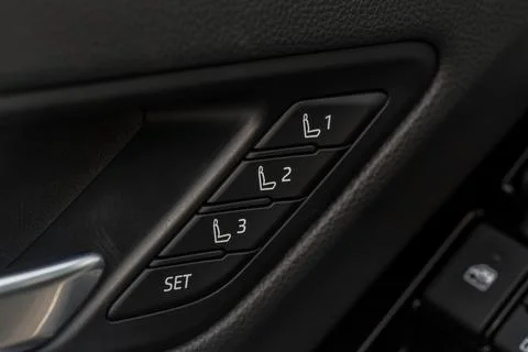 Memory car seat position buttons. Adjusting seat. Stock Photos