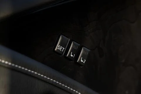 Memory car seat position buttons. Adjusting seat. Stock Photos
