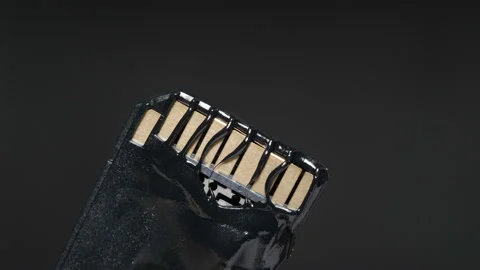 The memory card melts by heat and becomes degraded. Video stock 148475896