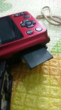 Memory Card at Old Digital Pocket Camera Stock Photos