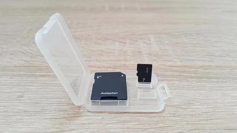 Memory card or Micro Sd card and adapter with case on wooden background Stock Photos