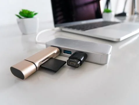 Memory Card Reader and USB Flash Drive on a Laptop Stock Photos