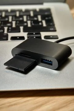 A memory card reader for reading and transferring information from a memory.. Stock Photos