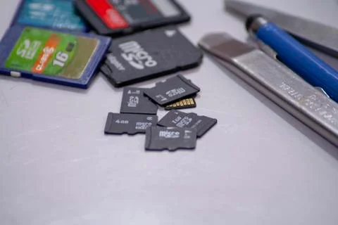 Memory card on table memory card on white office table Stock Photos