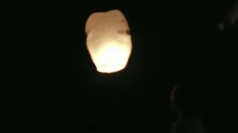 Memory Lantern Ascending Into Nights Sky Stock Footage 12599300