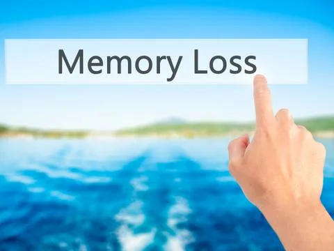Memory Loss - Hand pressing a button on blurred background concept on visual  Stock Photos