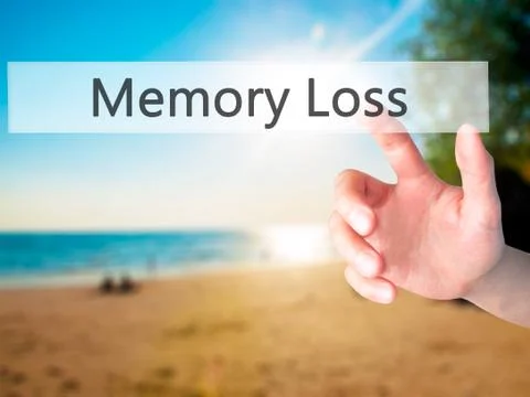 Memory Loss - Hand pressing a button on blurred background concept on visual  Stock Photos