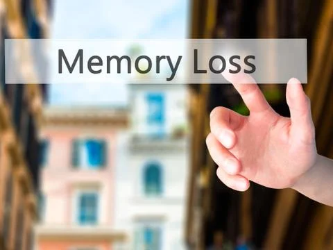 Memory Loss - Hand pressing a button on blurred background concept on visual  Stock Photos