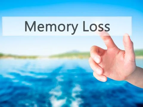 Memory Loss - Hand pressing a button on blurred background concept on visual  Stock Photos