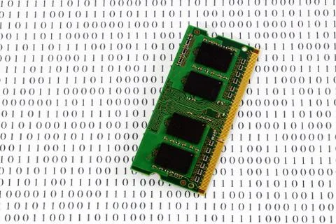 Memory module on binary code Stock Photos