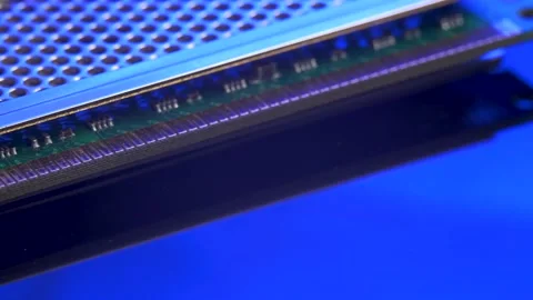 Memory module for PC with contact pins on blue light mirror surface Stock Footage 150455115