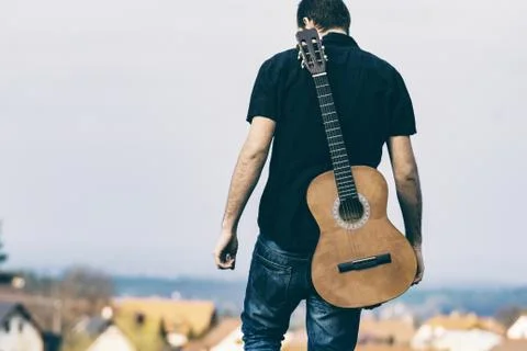 Men alone with guitar Foto stock