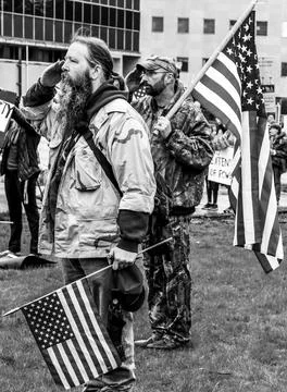 Men with American flags Stock-Fotos
