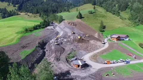 Men and equipment cleaning up after the mudslides Stock Footage 59165674