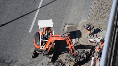Men and machine at work Stock Footage 73931390