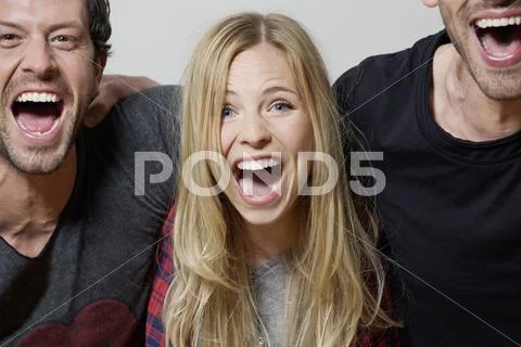 Men and woman shouting, portrait Stock Photos