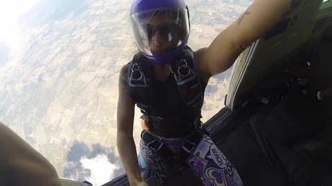 Men and women sky diving and parachuting. Stock Footage