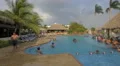 Men and women swimming in the pool at Playa Blanca Resort, Panama 4k or 4k+ Resolution