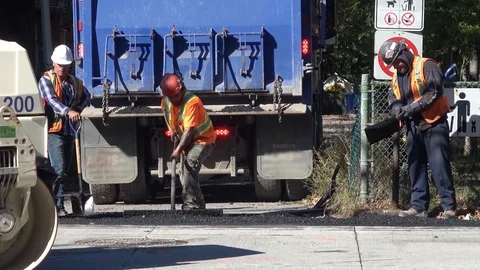 Men applying asphalt . Close view Stock-Footage 89571696