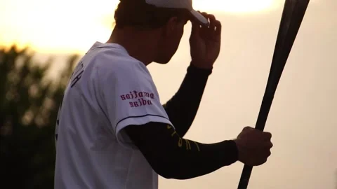 Men are hitting the baseball player  Stock Footage 158174066