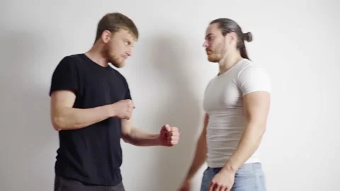 Men are trying to restrain laughter, you need to be serious, but they are very Stock Footage 131056954