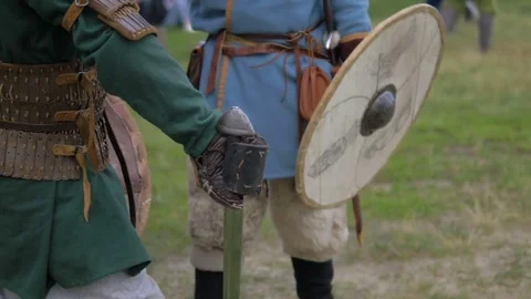 Men in armor preparing for battle Stock Footage 82408821