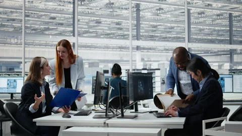 Men assessing semiconductor substrate quality using artificial intelligence LLM Stock Footage 335880233