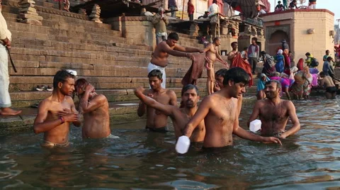 Men bathing in the Ganges river in Varanasi. Stock Footage 50415793