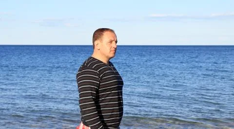 Men on the beach Stock Photos