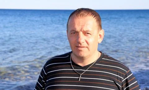 Men on the beach Stock Photos