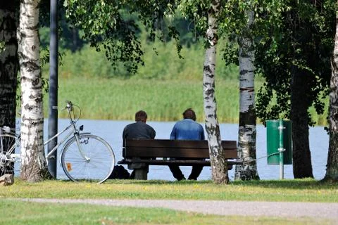 Men on the bench. Stock Photos