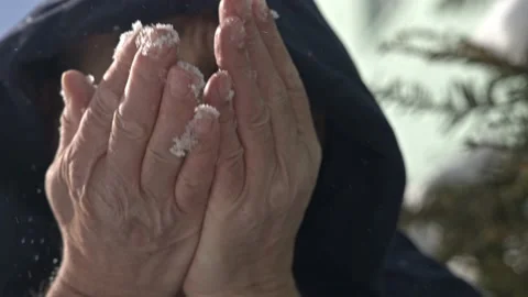 Men is blowing snow to camera 2 Stock Footage 172358461