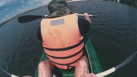 Men in a boat rowing with a paddle close-up Stock Footage 73457513