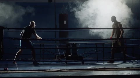 Men in boxing gym playing ping pong Stock Footage 314816907